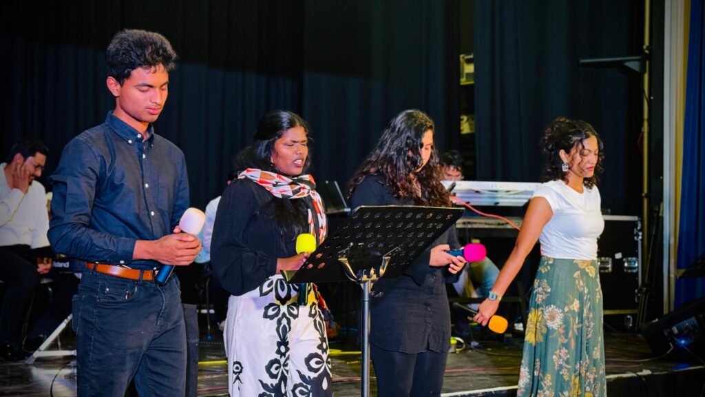 Singers leading worship at a Sunday service